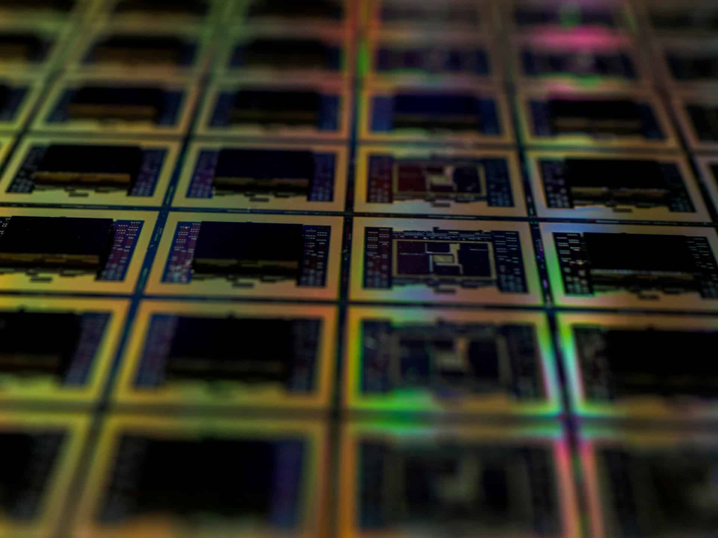 What are Cleanrooms Used For? A Quick Overview Close-up image of semiconductor wafers with intricate circuitry patterns.