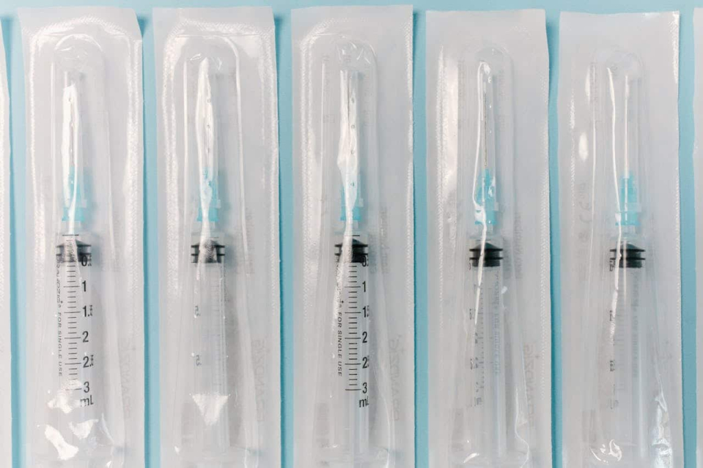 Types of Medical Cleanrooms You Should Know Five individually packaged sterile syringes arranged in a row.